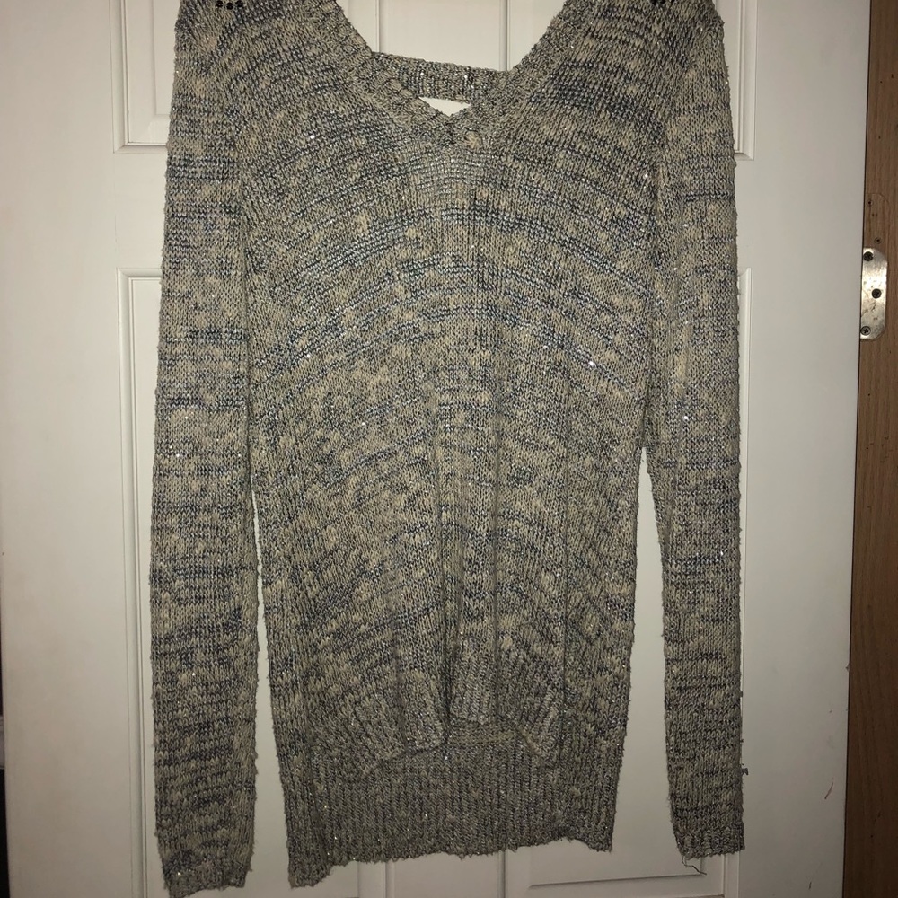 Sweater with embellished shoulders
